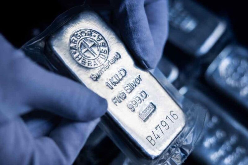 Silver extends gains on short squeeze as gold rallies to record